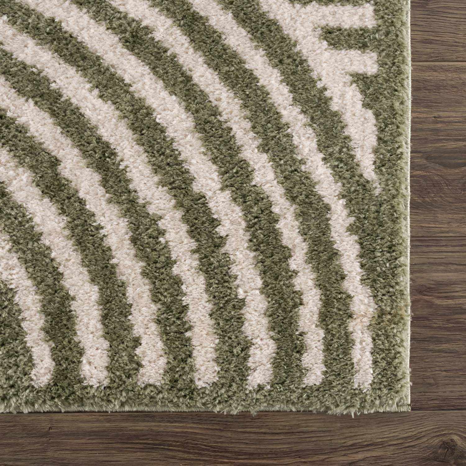 Close-up of the Allard Green Washable Area Rug. Lime green and cream stripes on a soft, textured polyester rug. Swatch