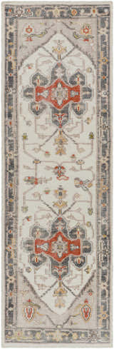 Close-up of the Halayhayin Premium Rug. Features a traditional pattern in brick red, brown, cream, and gray tones. Hand-knotted texture. Design-Runner-268