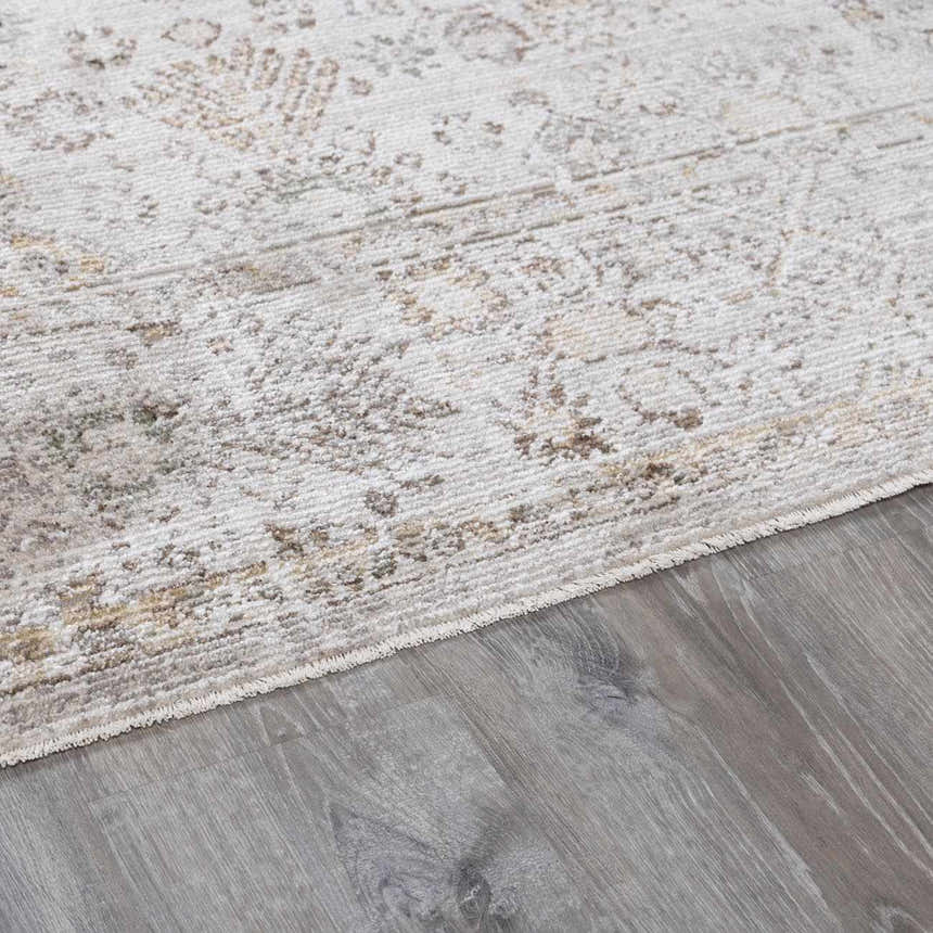 Close-up of the Galey Alix x Livabliss Myrtle Avenue I Area Rug. Cream rug with vintage oriental design and taupe, brown, and olive accents. Pile