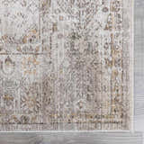 Close-up of the taupe and cream Galey Alix x Livabliss Myrtle Avenue I Area Rug, showing its vintage oriental pattern and texture. Swatch