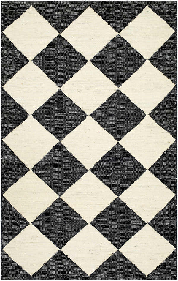 Close-up of the Andrin Black Area Rug. Hand-woven jute rug featuring a checkered diamond pattern in beige and black. Design-Rectangle-576