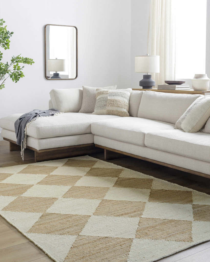 Living room with Antho Handmade Vivir x LIVABLISS VVAT-2301 rug, beige and ivory checkerboard pattern under a white sectional. Roomscene-Rectangle