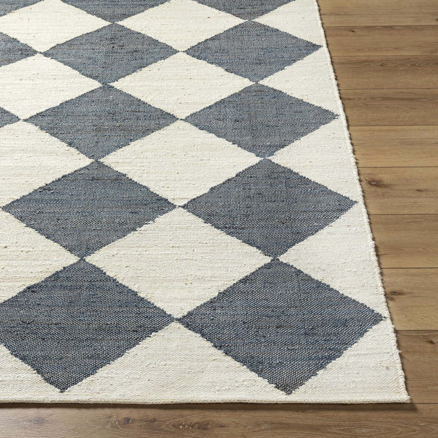 Close-up of Antho Handmade Vivir x LIVABLISS VVAT-2302 area rug. Ivory and slate gray diamond pattern, hand woven jute texture. Front
