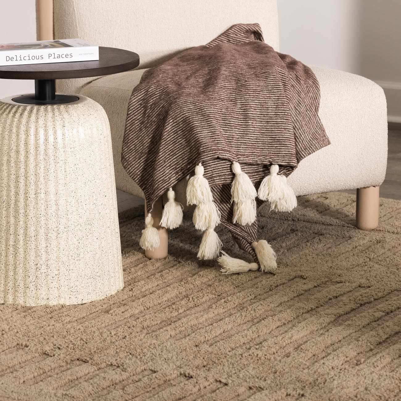 Washable Handmade Wool Rug - Brown placed in a styled room setting, harmonizing with surrounding room decor. Contemporary, Broken Striped, Textured Area Rug Backing  