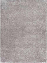 Close-up of the Lunaro Gray rug, featuring a subtle wavy abstract design and soft, shag-like texture. Design-Rectangle