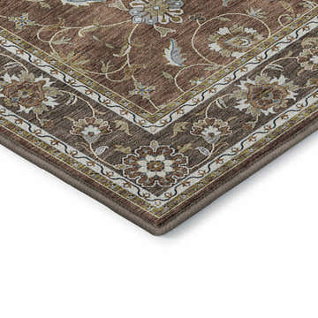 Close up of Dalyn Luxury Hatay HY1 Paprika Washable Area Rug with traditional floral pattern in beige, brown, and paprika.