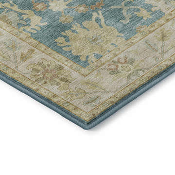 Close-up of Dalyn Luxury Hatay HY2 Teal Washable Area Rug. Features a traditional floral pattern in teal, beige, and blush pink.