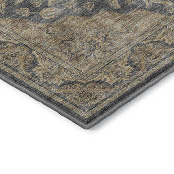 Close-up of the Dalyn Luxury Hatay HY3 Charcoal Washable Area Rug. Traditional design in caramel, gold, ivory, and taupe.