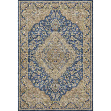Close-up of the Dalyn Luxury Hatay HY3 Navy Washable Area Rug. Features a traditional beige and navy floral pattern.