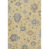 Close-up of the Dalyn Luxury Hatay HY4 Gold Washable Area Rug, featuring a traditional floral pattern in gold, blue, and blush pink.