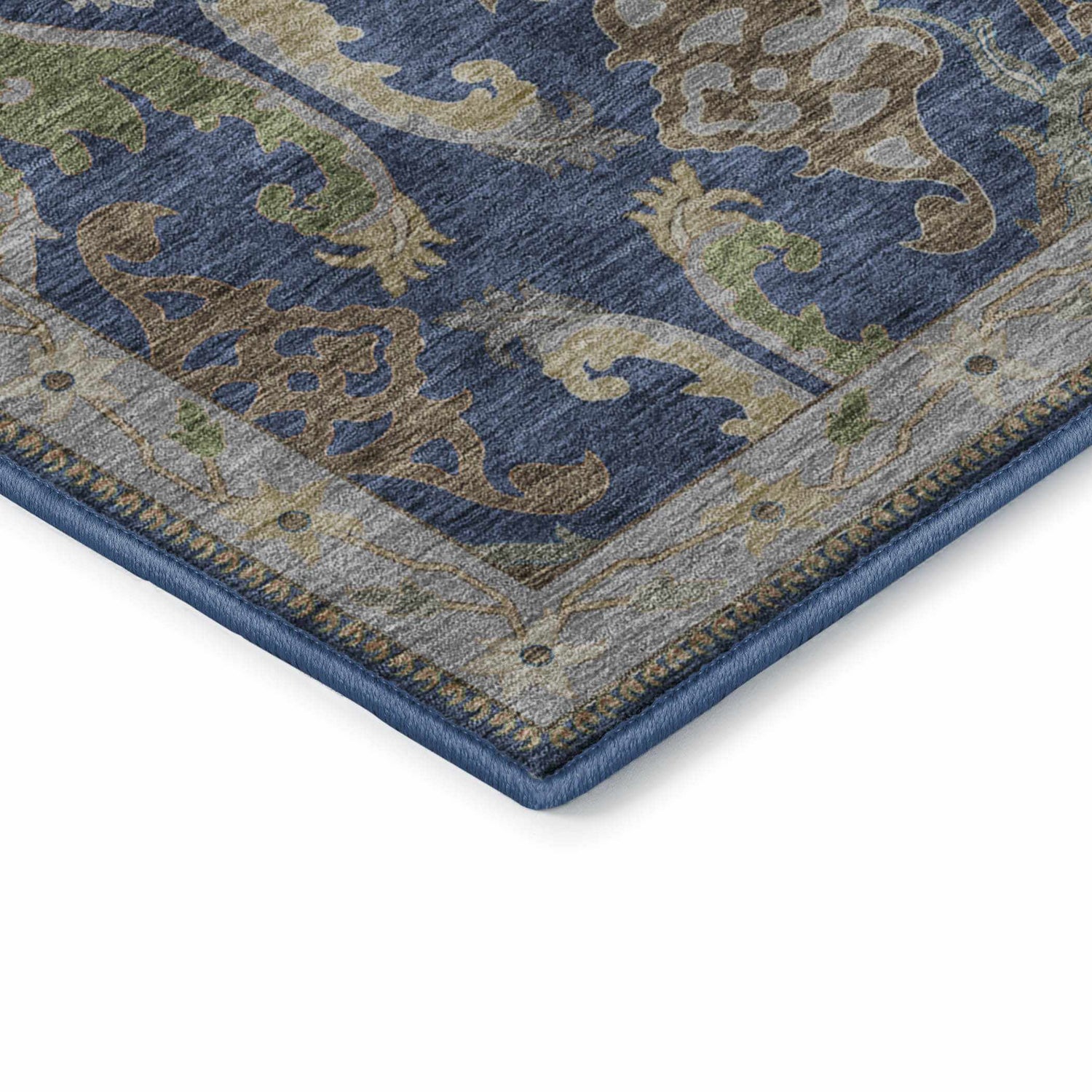 Close up of the Dalyn Luxury Hatay HY6 Navy Washable Area Rug showing the navy, beige, and brown traditional pattern.