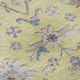 Close up of the Dalyn Luxury Hatay HY7 Yellow Washable Area Rug, featuring floral design in pink, blue and beige.