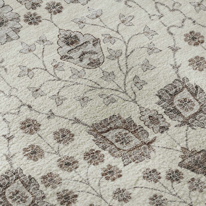 Close-up of the Dalyn Luxury Hatay HY8 Ivory Washable Area Rug, showcasing its floral design and beige, brown, and ivory tones.