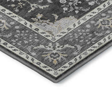 Close-up of the Dalyn Luxury Hatay HY9 Charcoal Washable Area Rug featuring a traditional floral pattern in charcoal, silver gray, and gold.