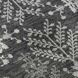 Close-up of Dalyn Luxury Hatay HY9 Charcoal Washable Area Rug featuring a silver gray floral branch pattern on a charcoal background.