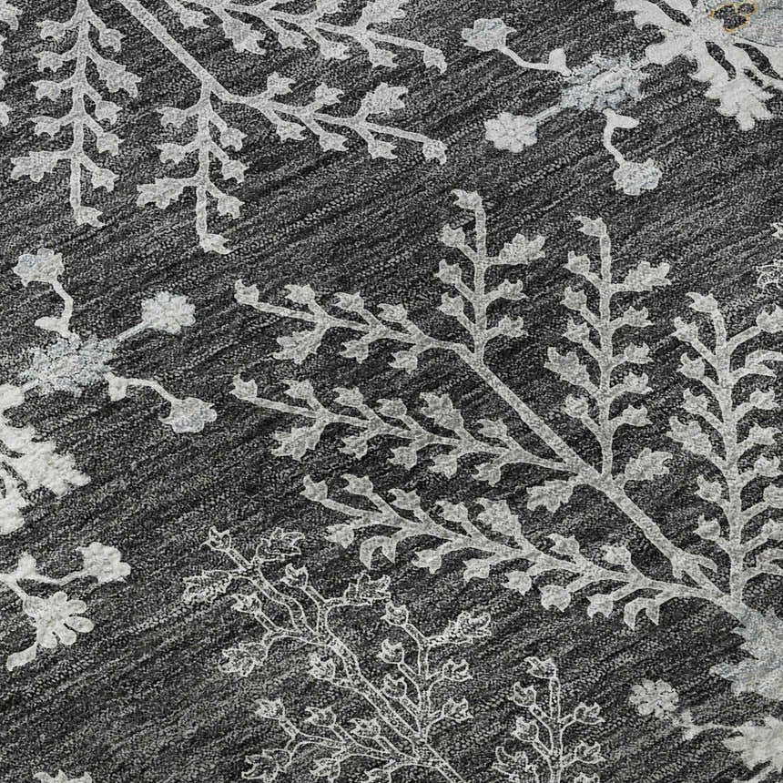 Close-up of Dalyn Luxury Hatay HY9 Charcoal Washable Area Rug featuring a silver gray floral branch pattern on a charcoal background.