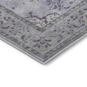 Close-up of the Dalyn Luxury Hatay HY9 Lavender Washable Area Rug featuring a traditional purple and gold floral pattern.