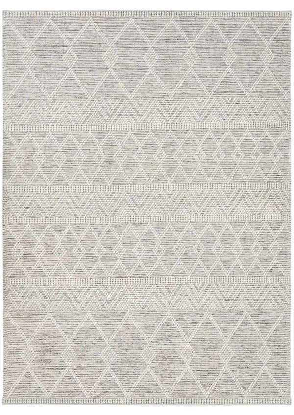 Close-up of the New Whittington Area Rug. Hand-woven wool rug in medium gray and off-white with a geometric diamond pattern. Design-Rectangle