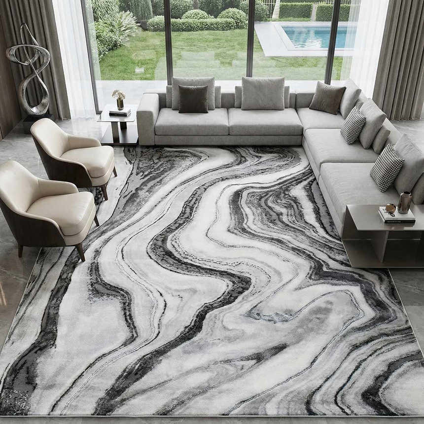 Living room with gray sectional and Itotia Marble Green Area Rug featuring a swirling marble design. Roomscene-Rectangle
