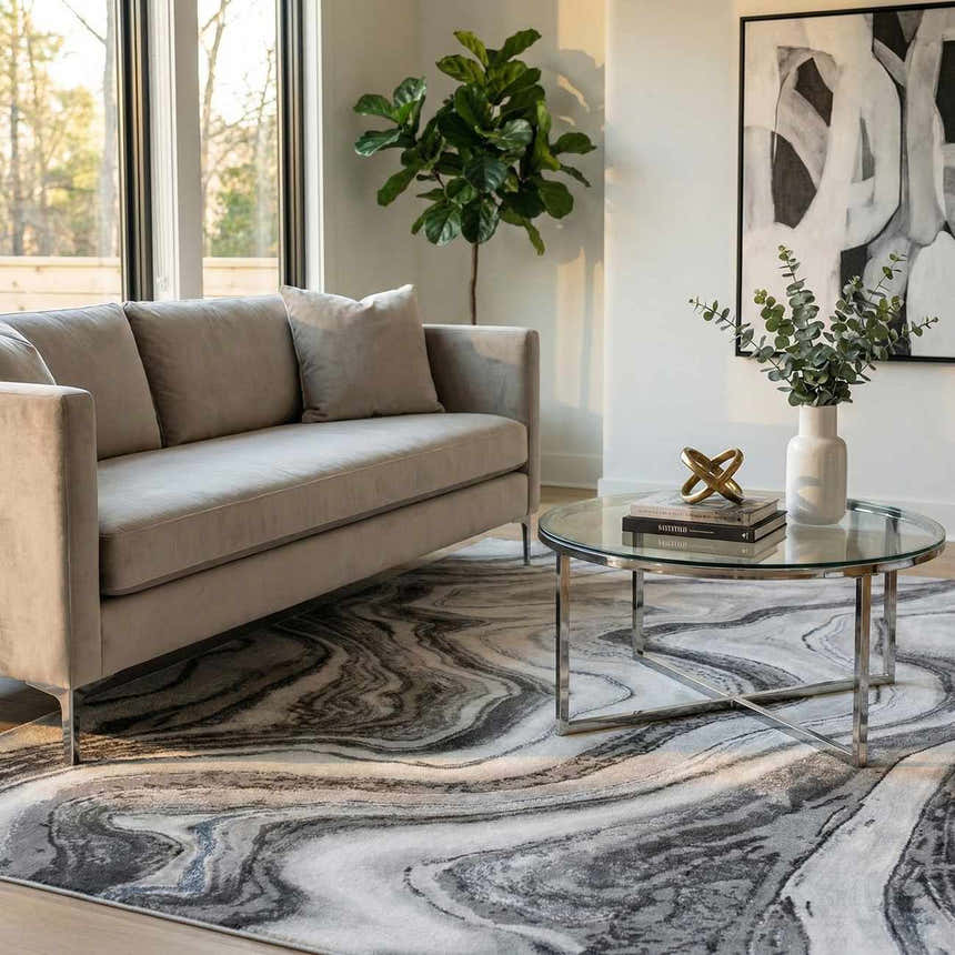 Living room scene with a gray sofa and the Itotia Marble Green Area Rug with a swirling marble pattern. Roomscene-Rectangle
