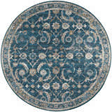 Close-up of round Dalyn Jericho JC4 Navy area rug. Features a traditional floral pattern in navy, brown, and gold.