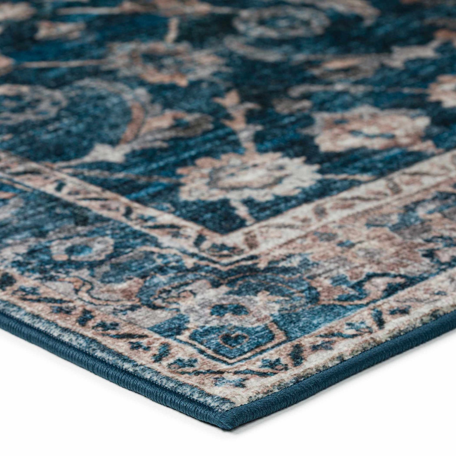 Close-up of the Dalyn Indoor/Outdoor Jericho JC4 Navy Area Rug featuring a traditional floral pattern in navy, brown, and gold.