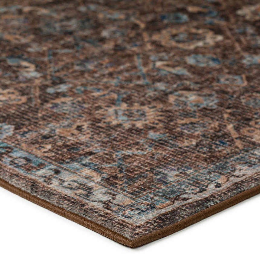 Close-up of the Dalyn Indoor/Outdoor Jericho JC8 Sable Area Rug showing its brown, sable, and denim traditional pattern.