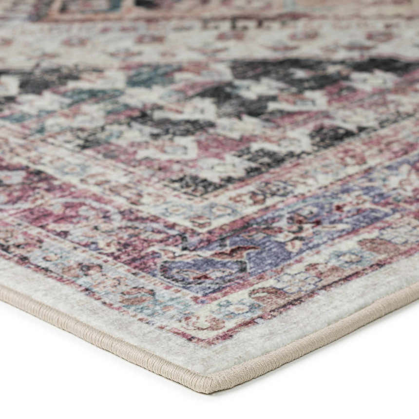 Close-up of the Dalyn Jericho JC9 Pearl Area Rug showing its traditional design, pearl, purple, and teal colors.