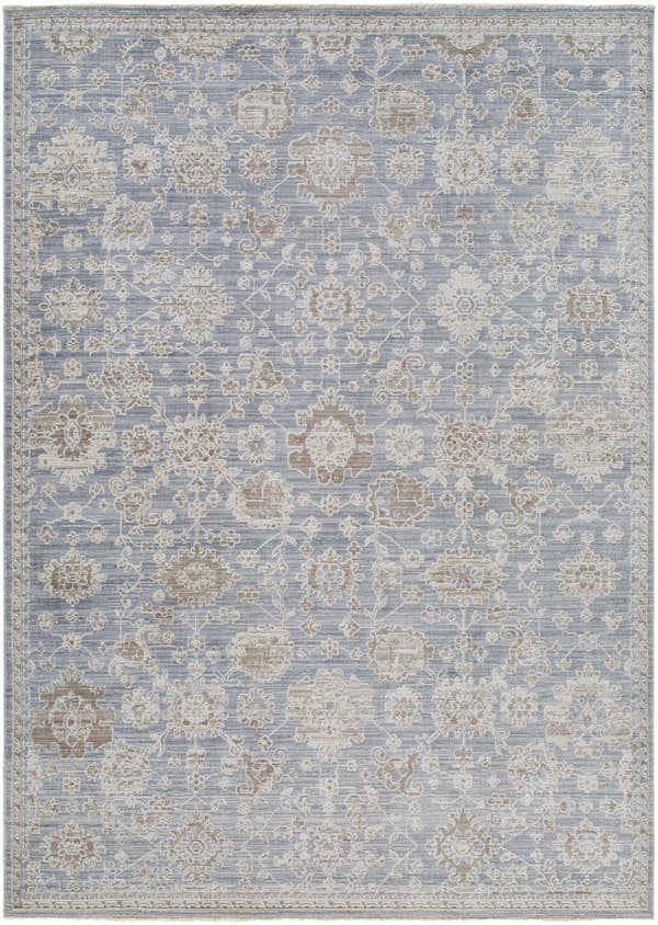 Close-up of the Urara Blue Area Rug, featuring a traditional floral pattern in desert sand, silver gray, and slate blue. Design-Rectangle-537