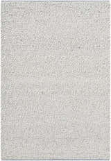 Close-up of the Wolven Ivory rug showing its chunky looped weave texture and neutral dove gray and ivory colors. Design-Rectangle-576