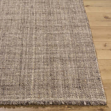 Close up of the hand woven texture of the Pufoe Modern Wool Area Rug in neutral tones. Front
