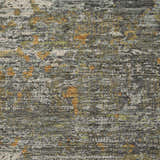 Close-up of Dalyn Luxury Indoor/Outdoor Kochi KC12 Gray Area Rug. Shows texture, gray, chestnut, and peach colors.