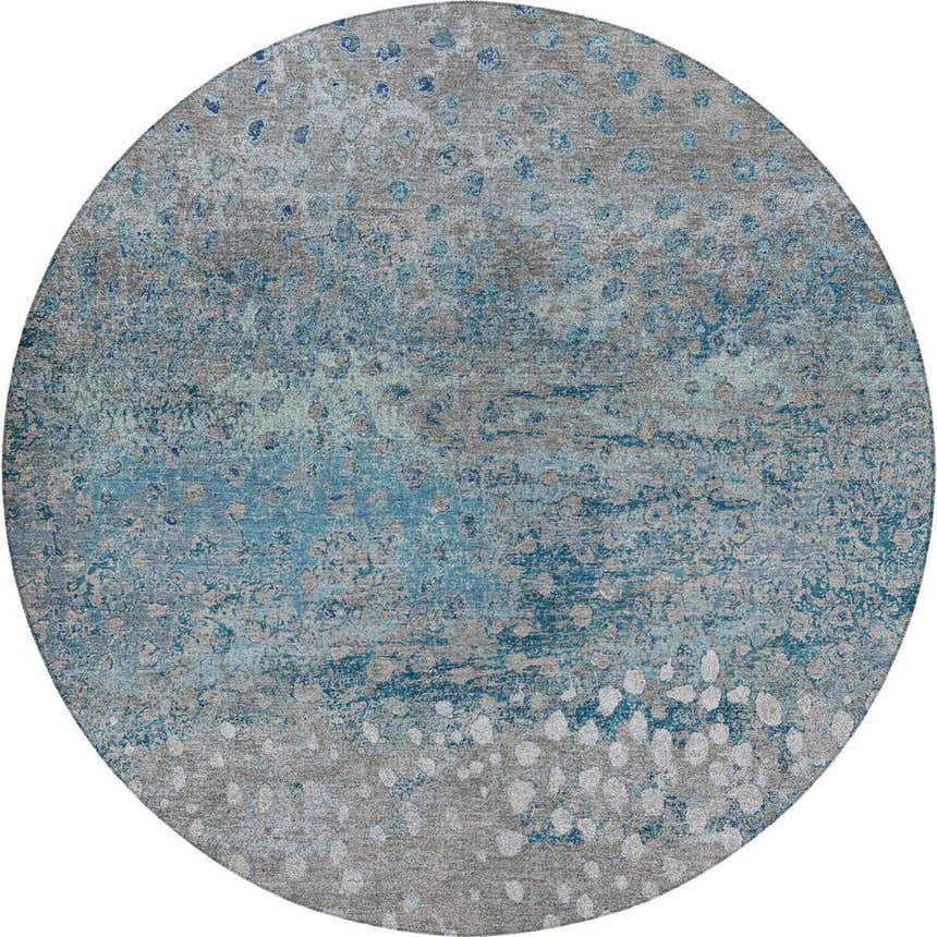 Close-up of round Dalyn Luxury Kochi KC13 Gray Area Rug. Features denim, navy, and silver gray abstract pattern.