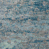 Close-up of the Dalyn Luxury Kochi KC13 Gray Area Rug. Features a textured pattern in denim, silver gray, and teal.