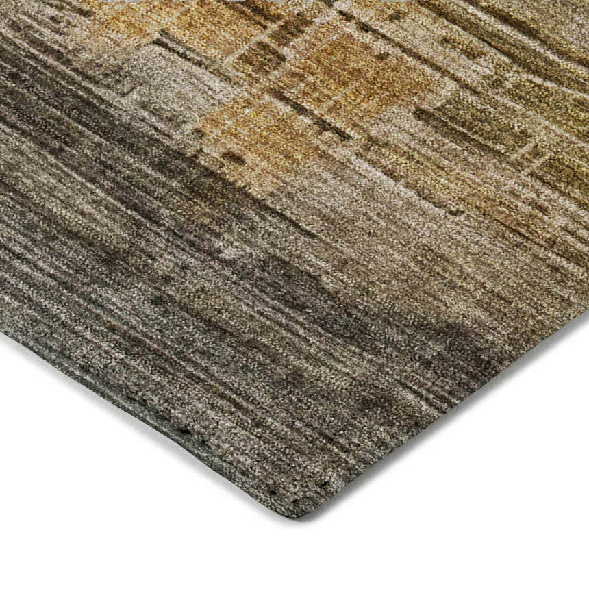 Close-up of Dalyn Luxury Kochi KC15 Granite area rug. Features beige, gold, and gray tones with a subtle, textured pattern.