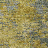 Close-up of the Dalyn Luxury Kochi KC2 Gold Area Rug. Features a textured gold, taupe, and peach abstract design.