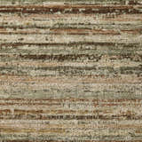 Close-up of the Dalyn Luxury Kochi KC3 Mocha rug. Features a textured, striped pattern in caramel, fudge, ivory, and light brown.