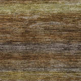 Close-up of the Dalyn Luxury Indoor/Outdoor Kochi KC5 Brown Area Rug. Features dark brown, gold, ivory, and olive hues.