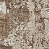 Close-up of the Dalyn Luxury Kochi KC7 Brown Area Rug, showing beige, chestnut, and brown abstract pattern and textured weave.