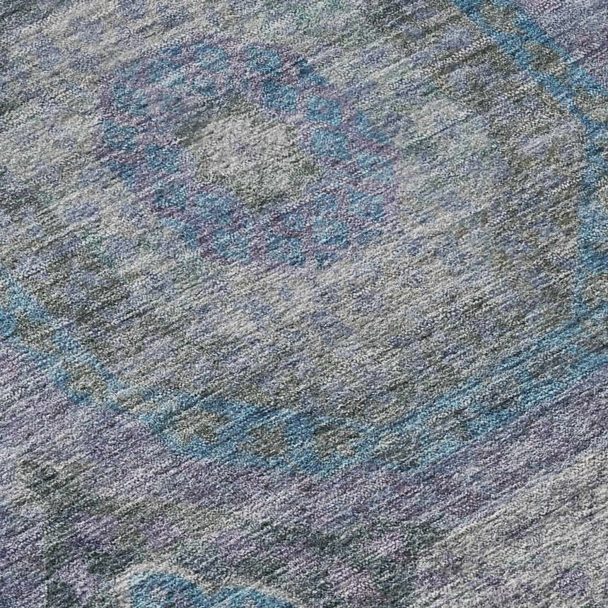 Close-up of Dalyn Karaj KJ6 Blue Washable Area Rug. Denim, light blue, purple, and gray farmhouse traditional rug.