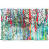 Close-up of the Dalyn Machine Kikiamo KK2 Confetti Washable Area Rug with bright pink, teal, and purple hues. Contemporary style.