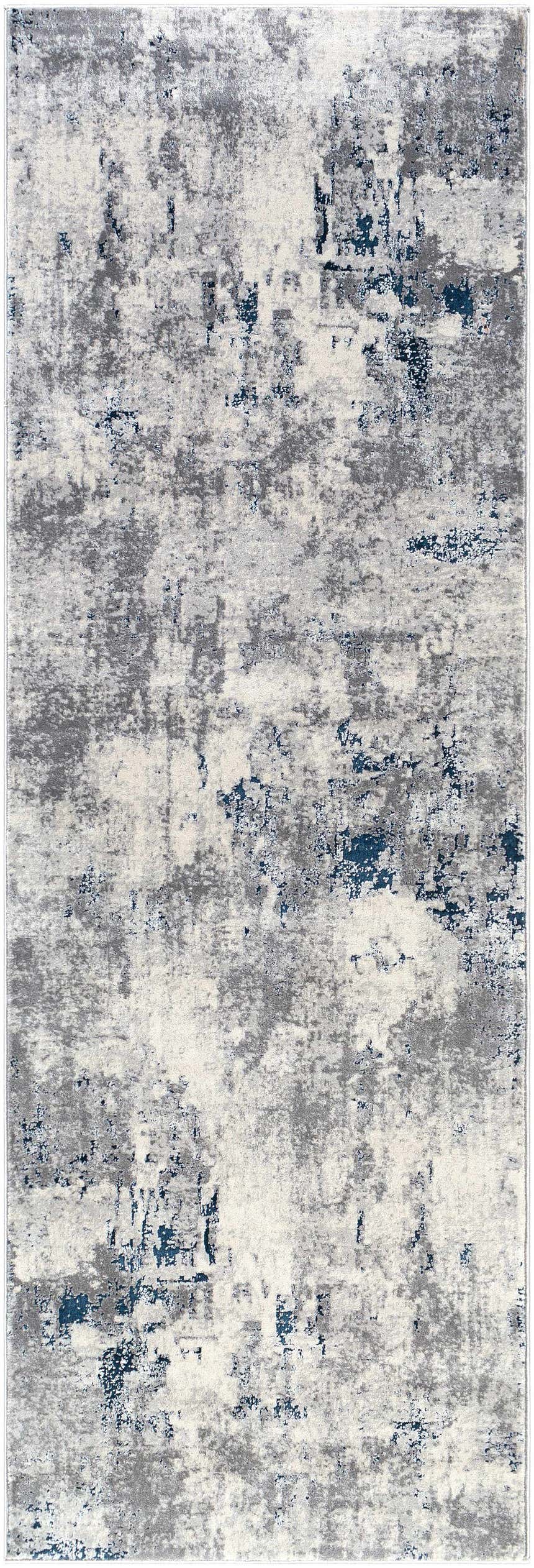 Close-up of Livabliss Aisha Surya AIS-2314 area rug with abstract pattern in blue, charcoal, light gray, and off-white. Design-Runner-2777