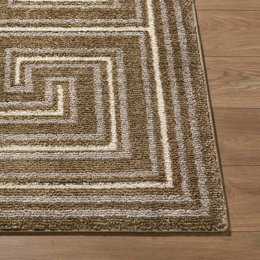 Close-up of the Kekapa Area Rug. Farmhouse style rug with brown and ivory geometric pattern and textured weave. Front