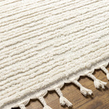 Kulu Textured Area Rug with Tassels