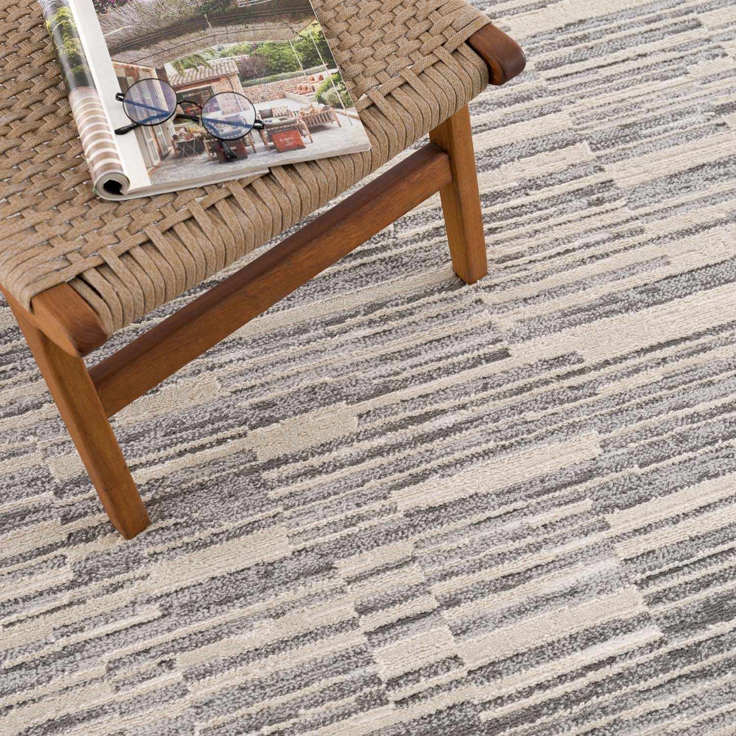 Reverse side of Alexey Gray Broken-Striped Area Rug, focusing on underside structure and material.Contemporary Area Rug Backing  