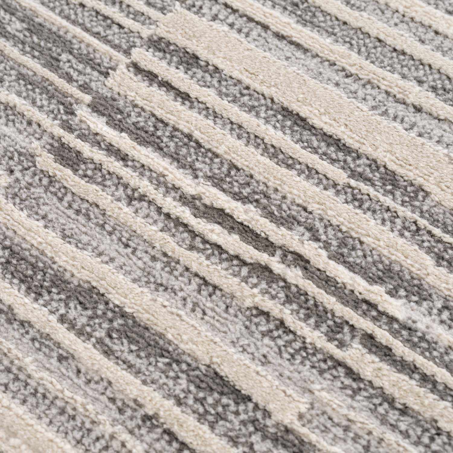 Close-up of the texture on Alexey Gray Broken-Striped Area Rug, showing fabric weave and feel. Contemporary Area Rug Backing  
