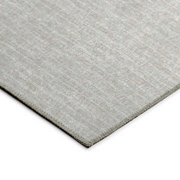 Close-up of the Laidley LA1 Linen Washable Area Rug. Beige and chestnut tones with a subtle textured pattern.