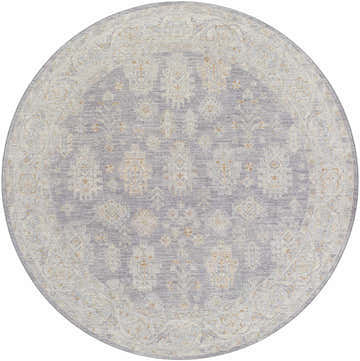 Close-up of a round Coby Brown Avant Garde rug. Features a traditional pattern in brown, charcoal, sage, gray, and teal. Design-Round-67