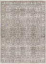 Detailed view of the Lugo Luxe Area Rug, a traditional rug with a charcoal and light gray floral pattern and tassel detail. Design-Rectangle-537
