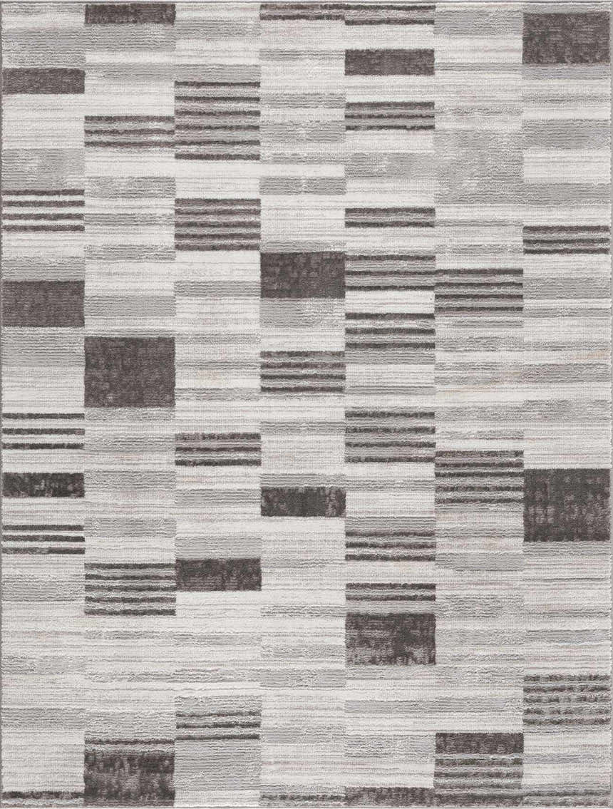 Close-up of the Bronka Broken-Striped Area Rug. Geometric design in black, gray, and off-white. Machine woven texture. Design-Rectangle-5373
